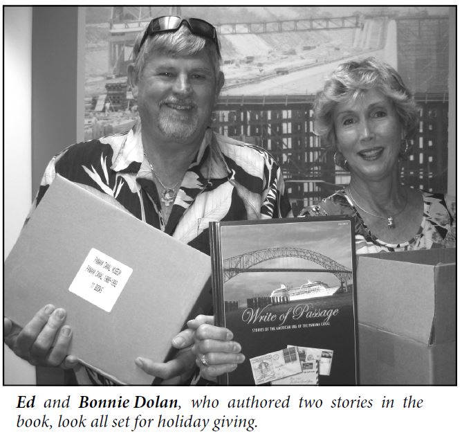 Ed and Bonnie Dolan hold up copies of the Write of Passage book.
