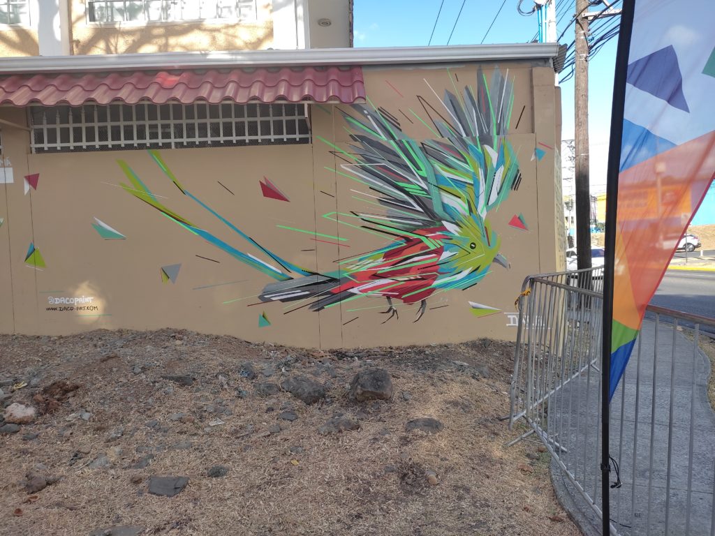 mural on the side of el Centro De Desarrollo Comunitario Sidney Young